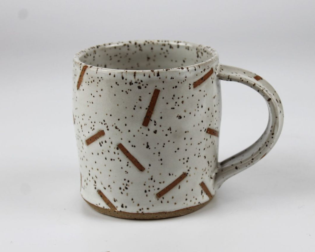 white rattle mug with thin confetti